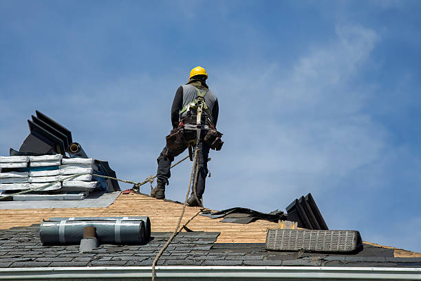 Professional Roofing technician working in Kouts, IN